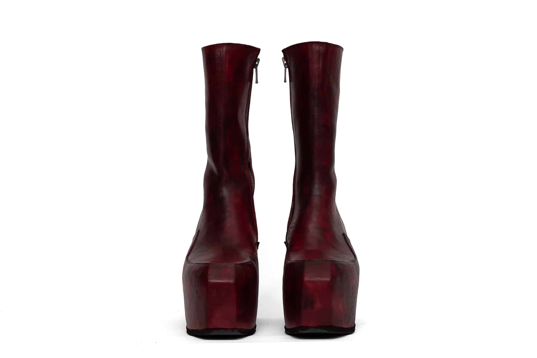 high heeled platform boots in red