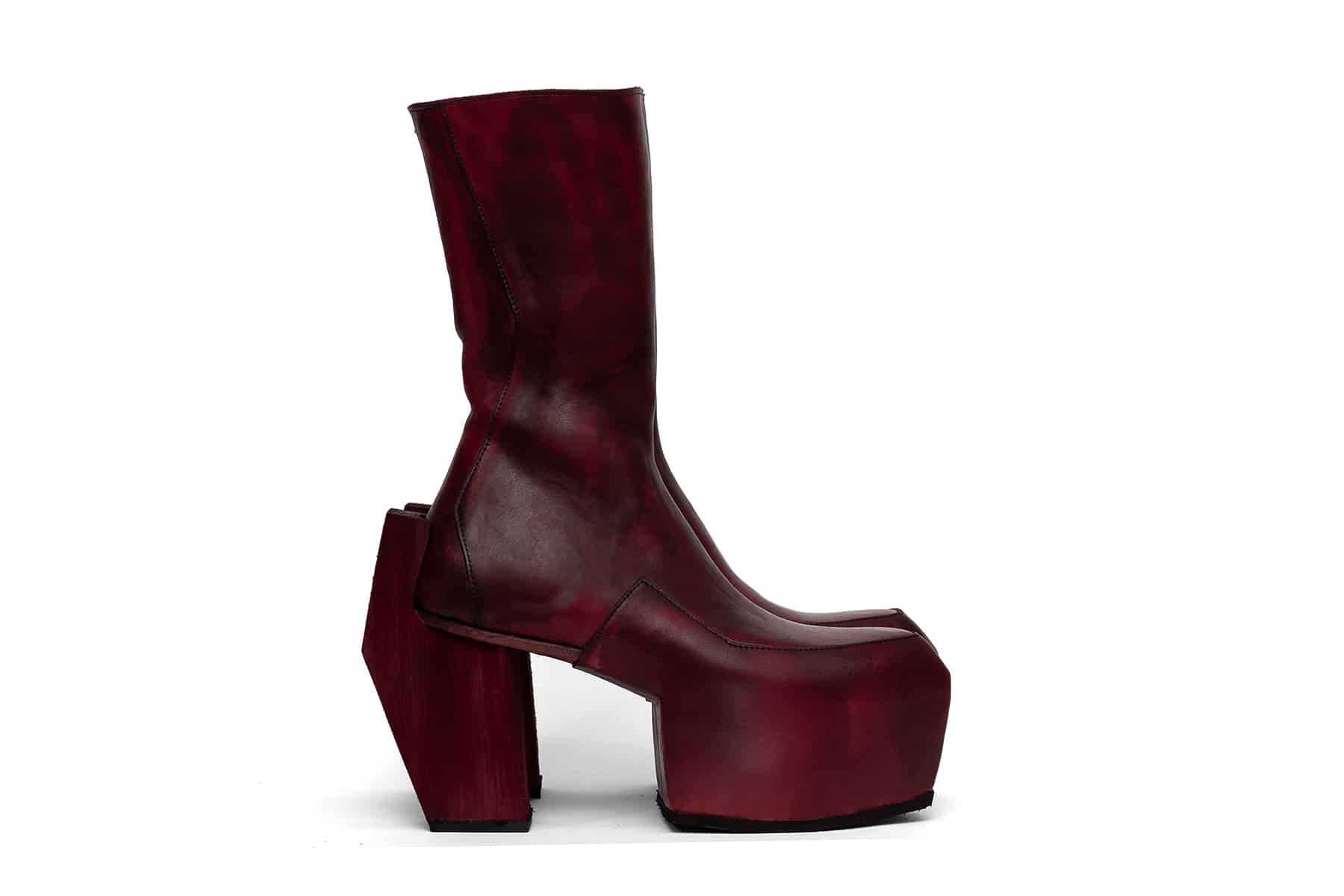 high heeled platform boots in red