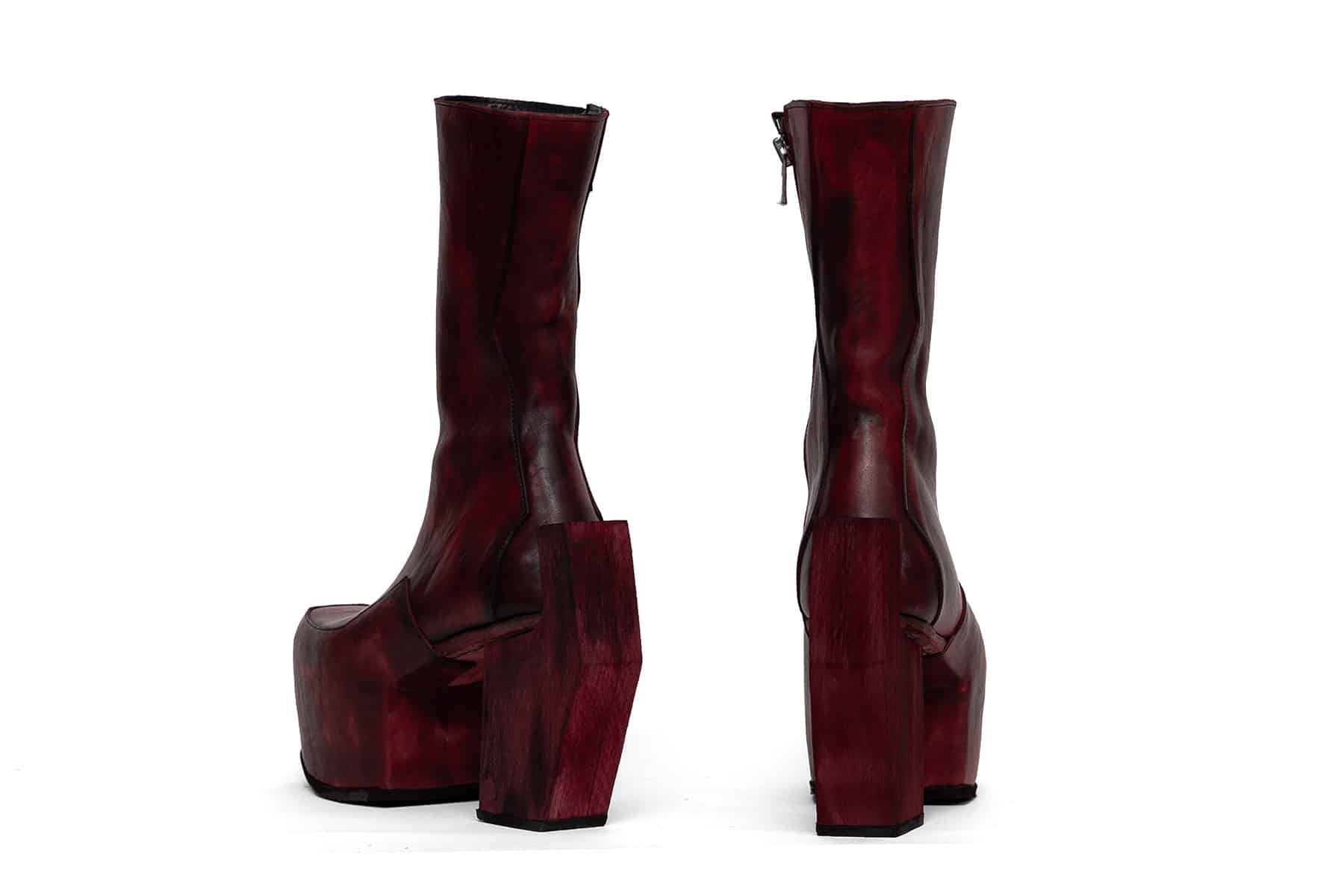 high heeled platform boots in red