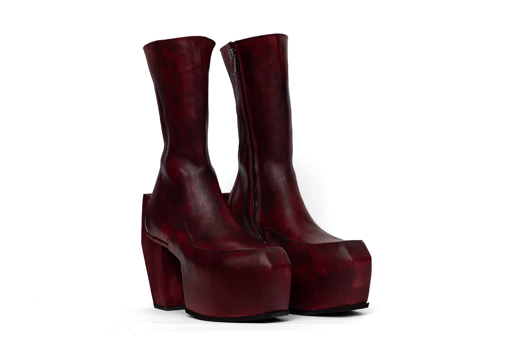 high heeled platform boots in red