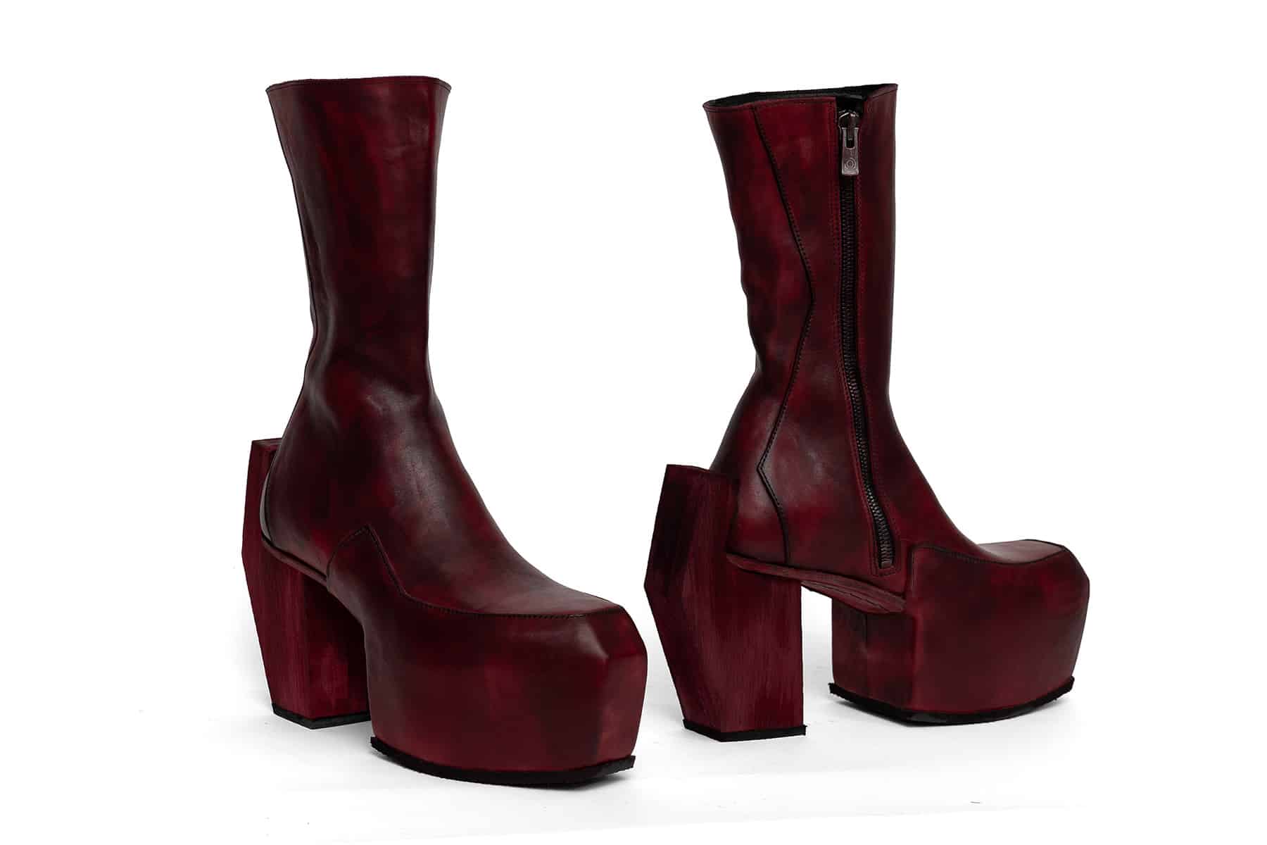 high heeled platform boots in red