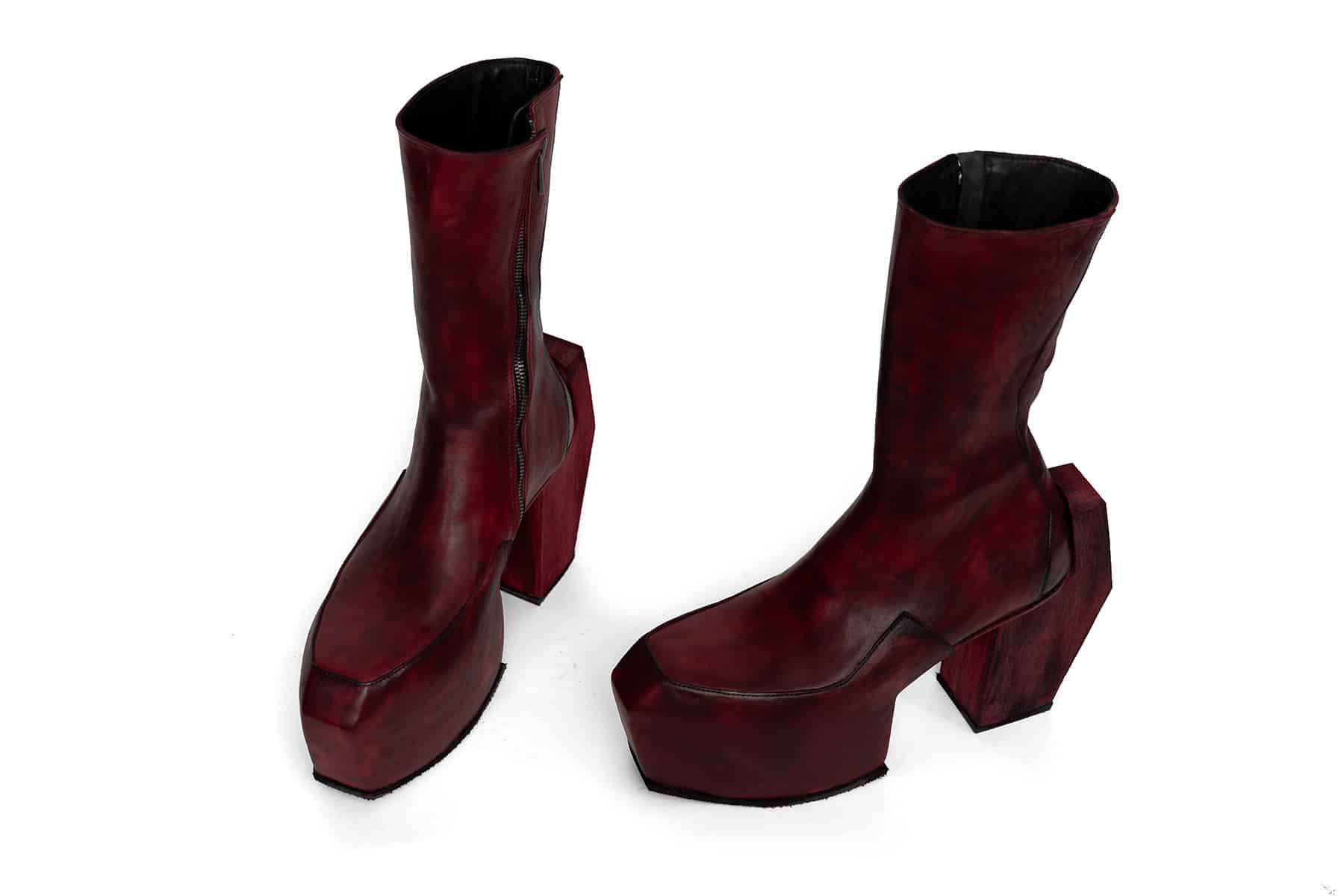 high heeled platform boots in red