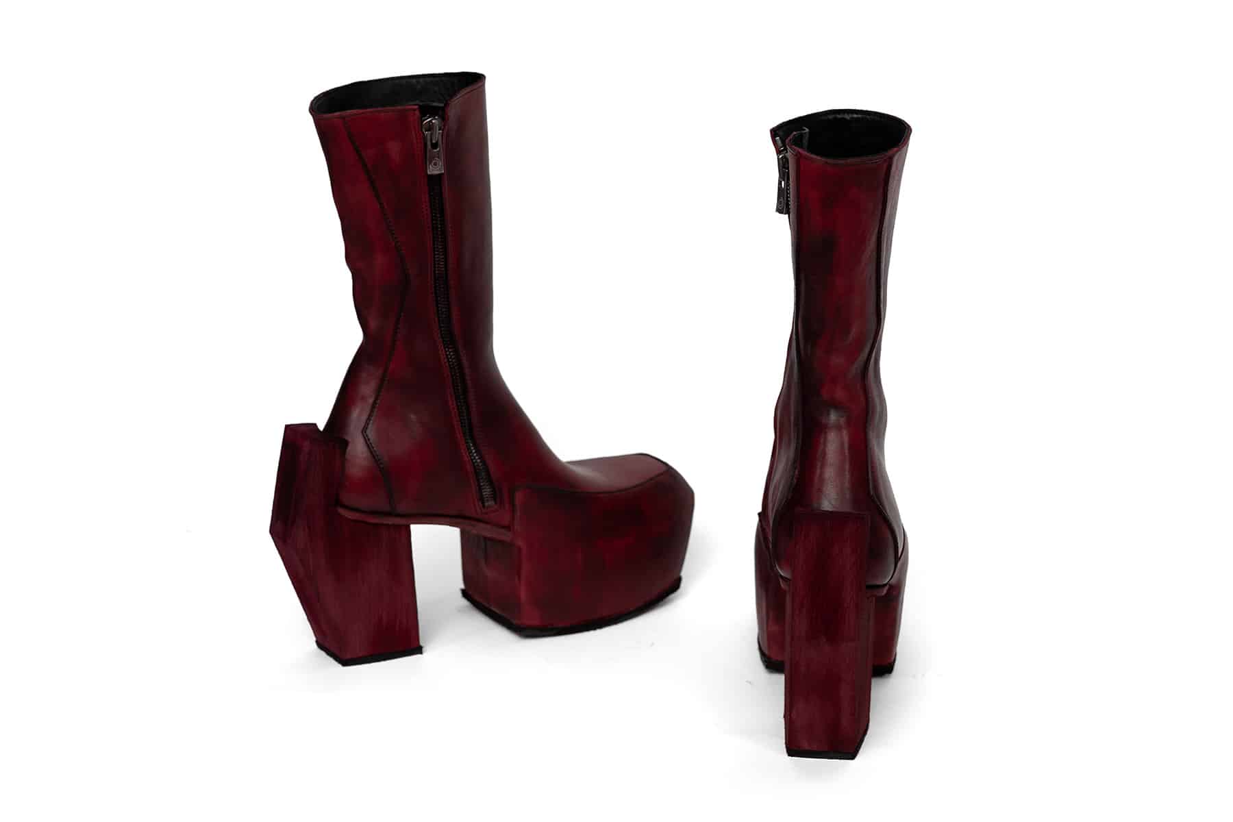 high heeled platform boots in red